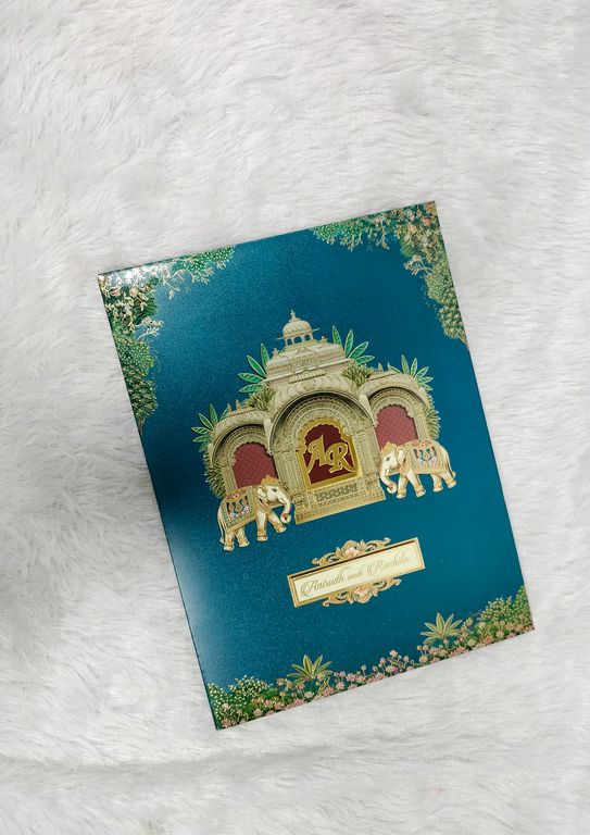 Teal Indian Wedding Card with Palace Jharokha Motif and Decorated Elephants ("575")